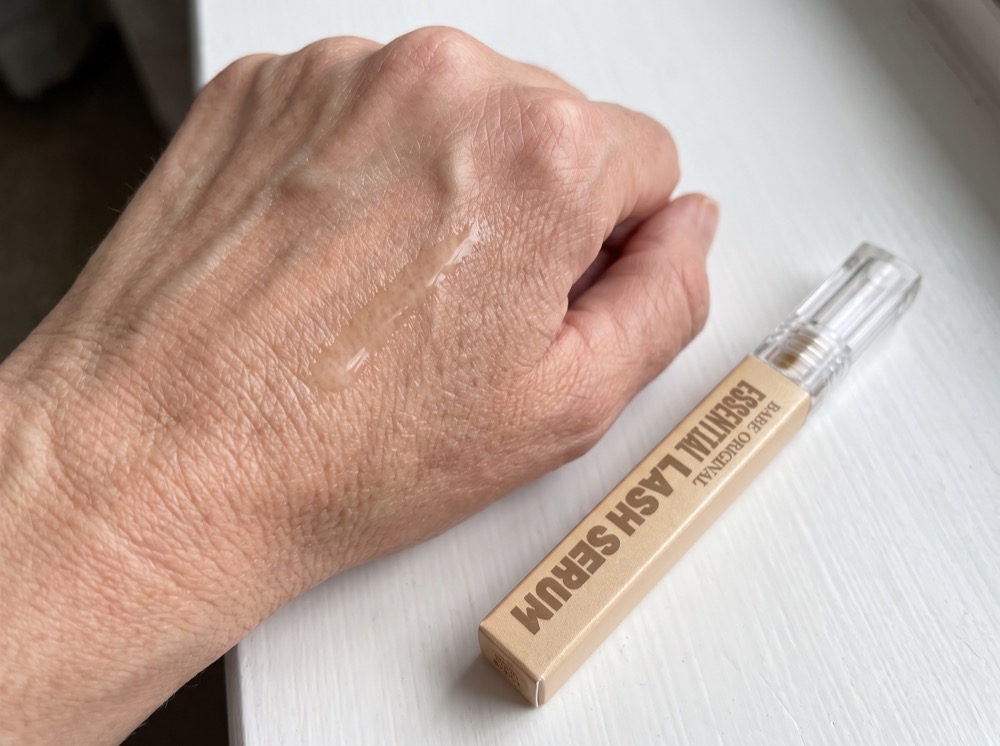 Serum swatch of Babe Original Essential Lash Serum on the back of a hand
