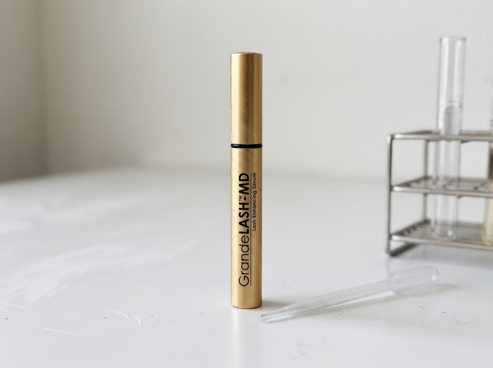 GrandeLASH-MD Lash Enhancing Serum on the test bench with pipette and test tube