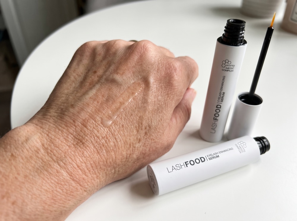 Serum swatch of LashFood Phyto-Medic Eyelash Enhancer on the back of a hand