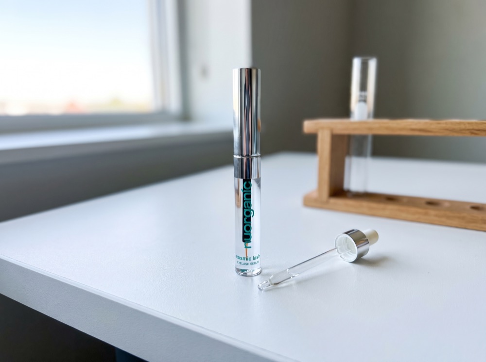 NuOrganic Cosmic Lash Serum on the test bench with pipette and test tube
