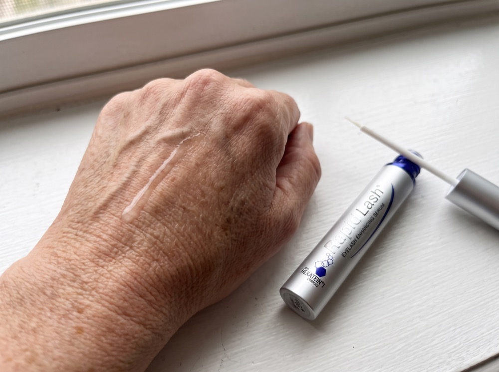 Serum swatch of RapidLash Eyelash Enhancing Serum on the back of a hand