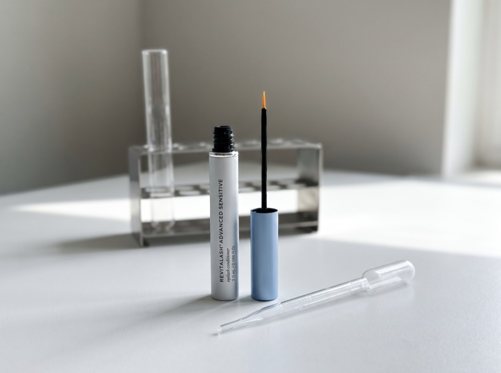 RevitaLash Advanced Eyelash Conditioner on the test bench with pipette and test tube